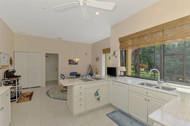 BEAUTIFUL HOME with POND and GOLF COURSE VIEWS! Situated on a on Boca Royale Golf and Country Club in Florida - for sale on GolfHomes.com, golf home, golf lot