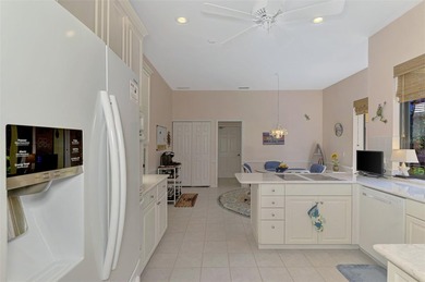 BEAUTIFUL HOME with POND and GOLF COURSE VIEWS! Situated on a on Boca Royale Golf and Country Club in Florida - for sale on GolfHomes.com, golf home, golf lot