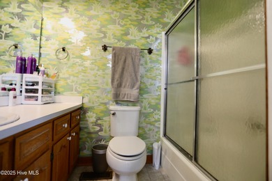 Excellent price on updated golf front beauty! Located just on Seven Lakes Country Club in North Carolina - for sale on GolfHomes.com, golf home, golf lot