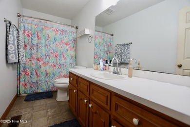 Excellent price on updated golf front beauty! Located just on Seven Lakes Country Club in North Carolina - for sale on GolfHomes.com, golf home, golf lot