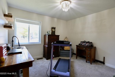 Excellent price on updated golf front beauty! Located just on Seven Lakes Country Club in North Carolina - for sale on GolfHomes.com, golf home, golf lot