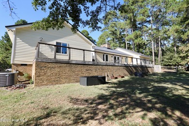 Excellent price on updated golf front beauty! Located just on Seven Lakes Country Club in North Carolina - for sale on GolfHomes.com, golf home, golf lot