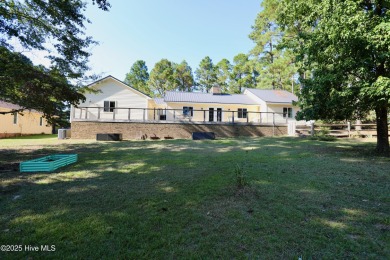Excellent price on updated golf front beauty! Located just on Seven Lakes Country Club in North Carolina - for sale on GolfHomes.com, golf home, golf lot