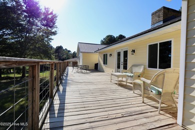 Excellent price on updated golf front beauty! Located just on Seven Lakes Country Club in North Carolina - for sale on GolfHomes.com, golf home, golf lot