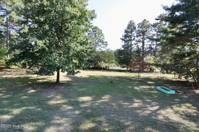 Excellent price on updated golf front beauty! Located just on Seven Lakes Country Club in North Carolina - for sale on GolfHomes.com, golf home, golf lot