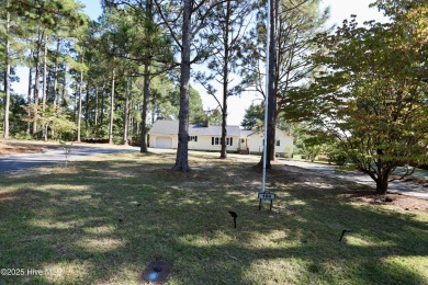 Excellent price on updated golf front beauty! Located just on Seven Lakes Country Club in North Carolina - for sale on GolfHomes.com, golf home, golf lot