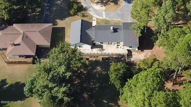 Excellent price on updated golf front beauty! Located just on Seven Lakes Country Club in North Carolina - for sale on GolfHomes.com, golf home, golf lot