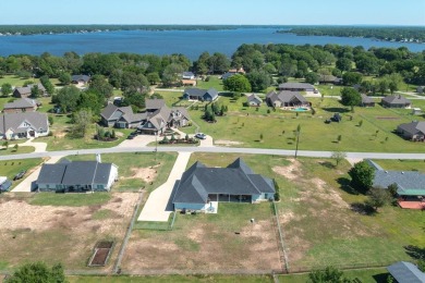WELCOME HOME to this meticulously maintained 2020 build in the on Star Harbor Golf Club in Texas - for sale on GolfHomes.com, golf home, golf lot