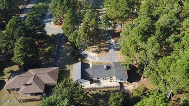 Excellent price on updated golf front beauty! Located just on Seven Lakes Country Club in North Carolina - for sale on GolfHomes.com, golf home, golf lot