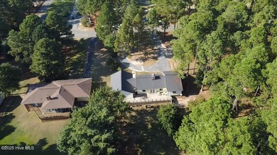 Excellent price on updated golf front beauty! Located just on Seven Lakes Country Club in North Carolina - for sale on GolfHomes.com, golf home, golf lot