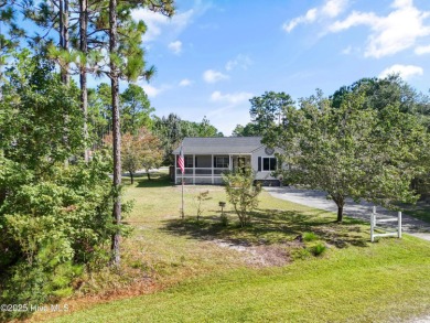 This meticulously maintained 3-bedroom, 2-bath ranch sits on a on The Lakes Country Club in North Carolina - for sale on GolfHomes.com, golf home, golf lot