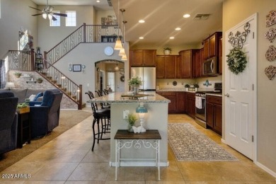 This beautiful 2,706-sqft home features an open floor plan with on Poston Butte Golf Club in Arizona - for sale on GolfHomes.com, golf home, golf lot