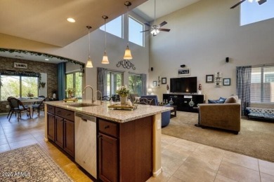 This beautiful 2,706-sqft home features an open floor plan with on Poston Butte Golf Club in Arizona - for sale on GolfHomes.com, golf home, golf lot