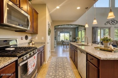 This beautiful 2,706-sqft home features an open floor plan with on Poston Butte Golf Club in Arizona - for sale on GolfHomes.com, golf home, golf lot