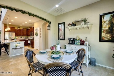 This beautiful 2,706-sqft home features an open floor plan with on Poston Butte Golf Club in Arizona - for sale on GolfHomes.com, golf home, golf lot