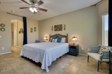 This beautiful 2,706-sqft home features an open floor plan with on Poston Butte Golf Club in Arizona - for sale on GolfHomes.com, golf home, golf lot