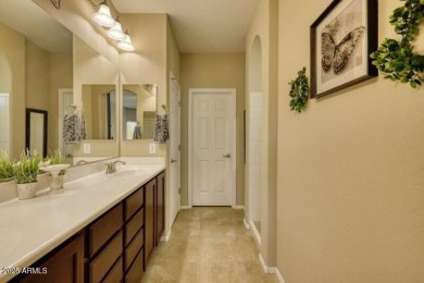 This beautiful 2,706-sqft home features an open floor plan with on Poston Butte Golf Club in Arizona - for sale on GolfHomes.com, golf home, golf lot