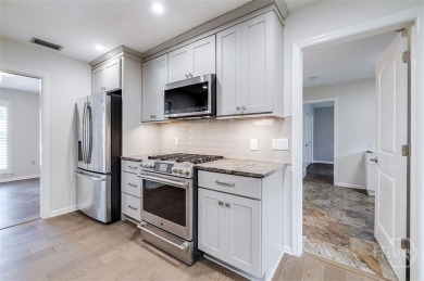 Fully renovated, one-level mid-century brick home overlooking on Wilmington Island Club in Georgia - for sale on GolfHomes.com, golf home, golf lot