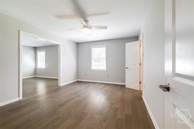 Fully renovated, one-level mid-century brick home overlooking on Wilmington Island Club in Georgia - for sale on GolfHomes.com, golf home, golf lot
