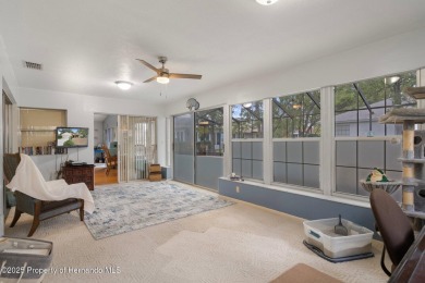 POOL HOME,  Enjoy this pool with spa home with 2021 pool heater on Timber Pines Golf Course in Florida - for sale on GolfHomes.com, golf home, golf lot