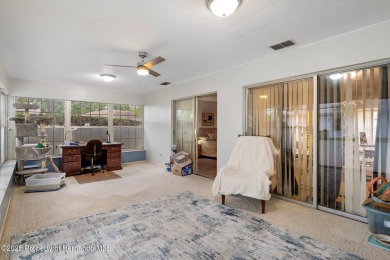 POOL HOME,  Enjoy this pool with spa home with 2021 pool heater on Timber Pines Golf Course in Florida - for sale on GolfHomes.com, golf home, golf lot