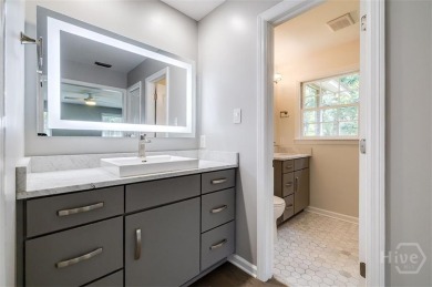 Fully renovated, one-level mid-century brick home overlooking on Wilmington Island Club in Georgia - for sale on GolfHomes.com, golf home, golf lot