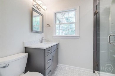 Fully renovated, one-level mid-century brick home overlooking on Wilmington Island Club in Georgia - for sale on GolfHomes.com, golf home, golf lot