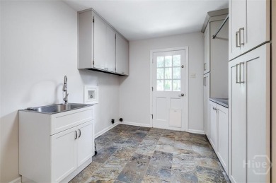 Fully renovated, one-level mid-century brick home overlooking on Wilmington Island Club in Georgia - for sale on GolfHomes.com, golf home, golf lot