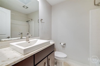 Fully renovated, one-level mid-century brick home overlooking on Wilmington Island Club in Georgia - for sale on GolfHomes.com, golf home, golf lot