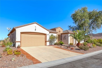 Immaculate Trenton model with mountain & city views! This on Revere Golf Club in Nevada - for sale on GolfHomes.com, golf home, golf lot