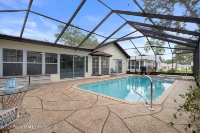 POOL HOME,  Enjoy this pool with spa home with 2021 pool heater on Timber Pines Golf Course in Florida - for sale on GolfHomes.com, golf home, golf lot