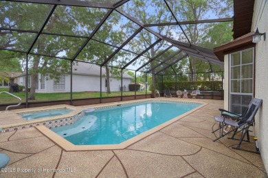 POOL HOME,  Enjoy this pool with spa home with 2021 pool heater on Timber Pines Golf Course in Florida - for sale on GolfHomes.com, golf home, golf lot