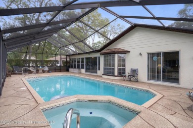 POOL HOME,  Enjoy this pool with spa home with 2021 pool heater on Timber Pines Golf Course in Florida - for sale on GolfHomes.com, golf home, golf lot