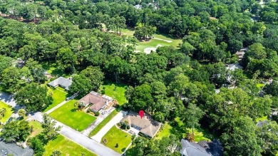 Fully renovated, one-level mid-century brick home overlooking on Wilmington Island Club in Georgia - for sale on GolfHomes.com, golf home, golf lot