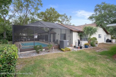 POOL HOME,  Enjoy this pool with spa home with 2021 pool heater on Timber Pines Golf Course in Florida - for sale on GolfHomes.com, golf home, golf lot