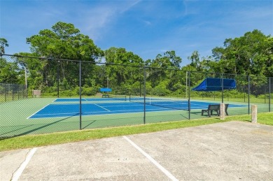 Fully renovated, one-level mid-century brick home overlooking on Wilmington Island Club in Georgia - for sale on GolfHomes.com, golf home, golf lot