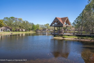 POOL HOME,  Enjoy this pool with spa home with 2021 pool heater on Timber Pines Golf Course in Florida - for sale on GolfHomes.com, golf home, golf lot