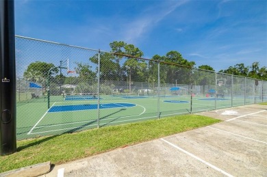 Fully renovated, one-level mid-century brick home overlooking on Wilmington Island Club in Georgia - for sale on GolfHomes.com, golf home, golf lot