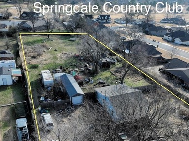 Nearly one-acre prime lot at the end of a quiet street near on Springdale Country Club in Arkansas - for sale on GolfHomes.com, golf home, golf lot