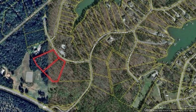 Build your dream home on this double lot 4.3 acre level wooded on The Patriot Golf Club At Grand Harbor in South Carolina - for sale on GolfHomes.com, golf home, golf lot