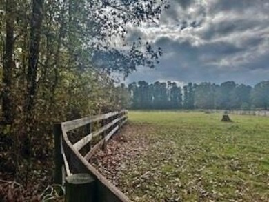 Build your dream home on this double lot 4.3 acre level wooded on The Patriot Golf Club At Grand Harbor in South Carolina - for sale on GolfHomes.com, golf home, golf lot