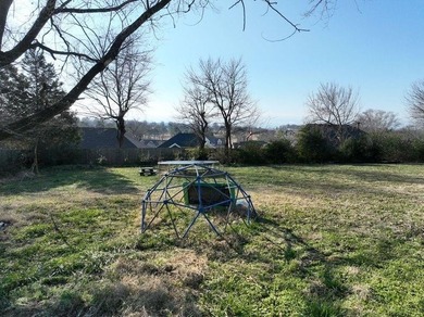 Nearly one-acre prime lot at the end of a quiet street near on Springdale Country Club in Arkansas - for sale on GolfHomes.com, golf home, golf lot