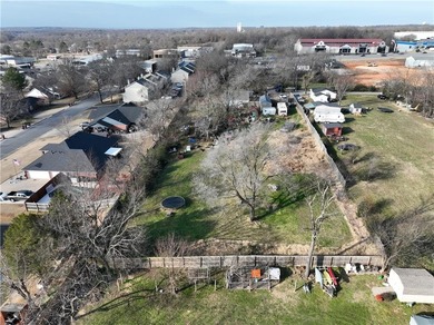 Nearly one-acre prime lot at the end of a quiet street near on Springdale Country Club in Arkansas - for sale on GolfHomes.com, golf home, golf lot