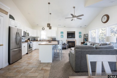 Turn-key 4-bedroom, 3.5-bath home with a private pool in The on The Currituck Golf Club in North Carolina - for sale on GolfHomes.com, golf home, golf lot