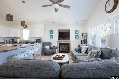 Turn-key 4-bedroom, 3.5-bath home with a private pool in The on The Currituck Golf Club in North Carolina - for sale on GolfHomes.com, golf home, golf lot