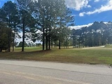 Build your dream home on this level wooded home site located at on The Patriot Golf Club At Grand Harbor in South Carolina - for sale on GolfHomes.com, golf home, golf lot