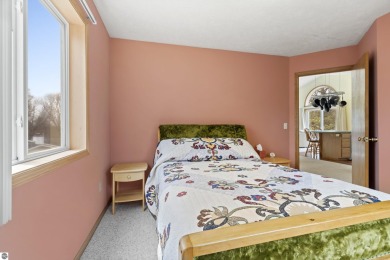 Nice 2 bedroom, 2 bath home that has seasonal views of Crystal on Crystal Lake Golf Club in Michigan - for sale on GolfHomes.com, golf home, golf lot