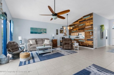 FANTASTIC MOVE IN READY POOL HOME with AWESOME REAR VIEW of HOLE on Heritage Pines Country Club in Florida - for sale on GolfHomes.com, golf home, golf lot