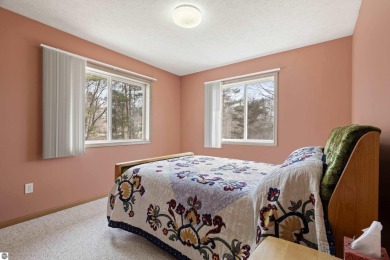 Nice 2 bedroom, 2 bath home that has seasonal views of Crystal on Crystal Lake Golf Club in Michigan - for sale on GolfHomes.com, golf home, golf lot