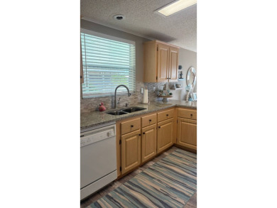 HIGHLY MOTIVATED SELLER!!!  Pride of ownership is evident on Sabal Springs Golf and Racquet Club in Florida - for sale on GolfHomes.com, golf home, golf lot